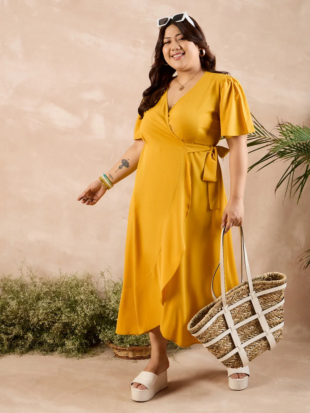 Berrylush Curve Women Solid Yellow V-Neck Flared Sleeves Tie-Up Waist Tulip Hem Wrap Maxi Dress